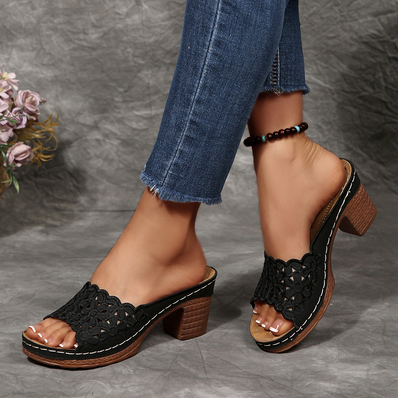Women's floral cut-out mules—open-toe, slip-on sandals featuring a platform and block heel.